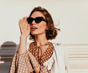 confident-caucasian-girl-dark-sunglasses-looking-distance-outdoor-shot-good-humoured-fashionable-woman